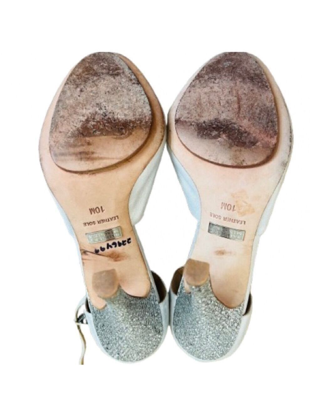 Badgley Mischka Women's
Laguna Platform Pumps Silver
Leather
Size 10 M - Picture 6 of 12